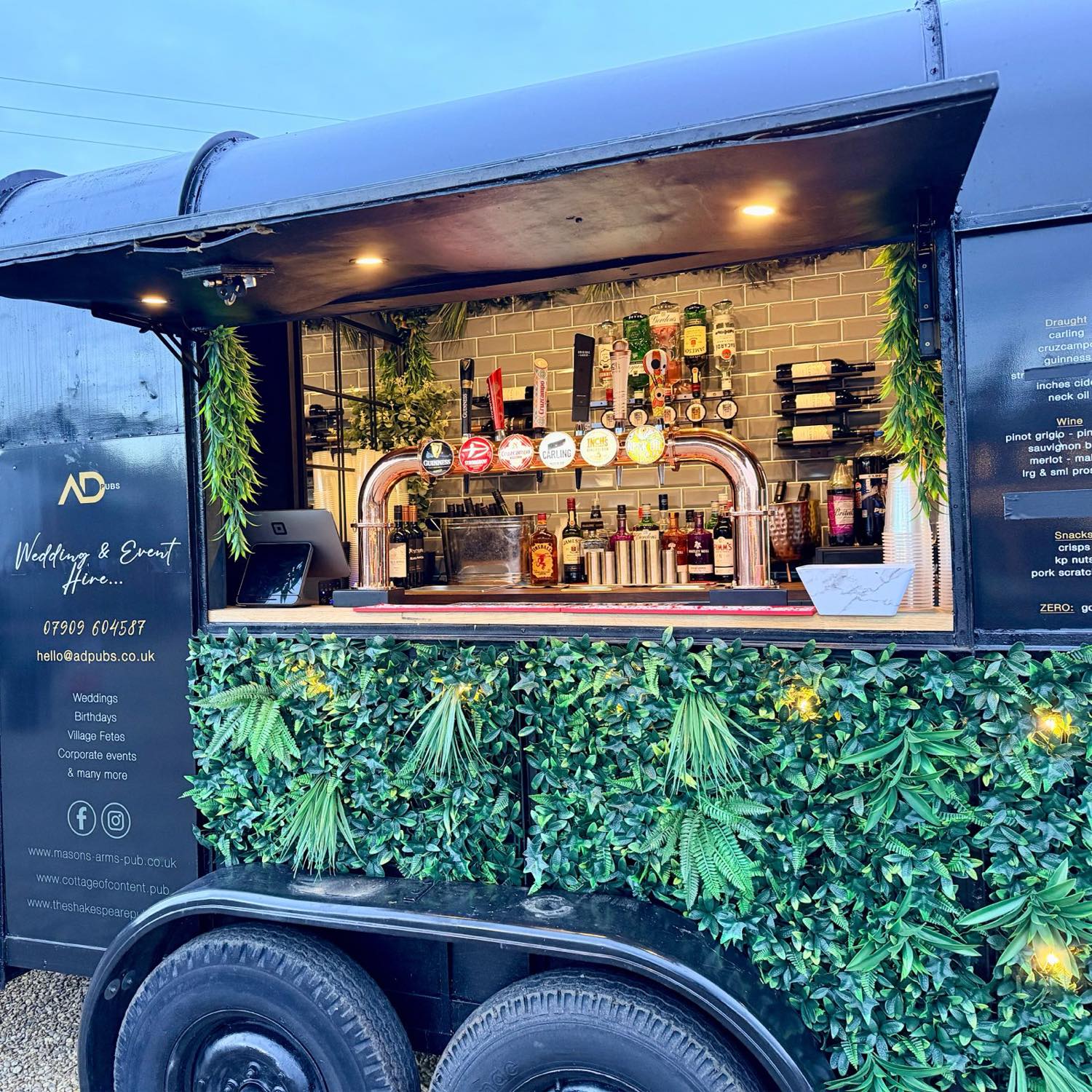 The horsebox bar with wedding & event hire signage and the ADevents contact details.